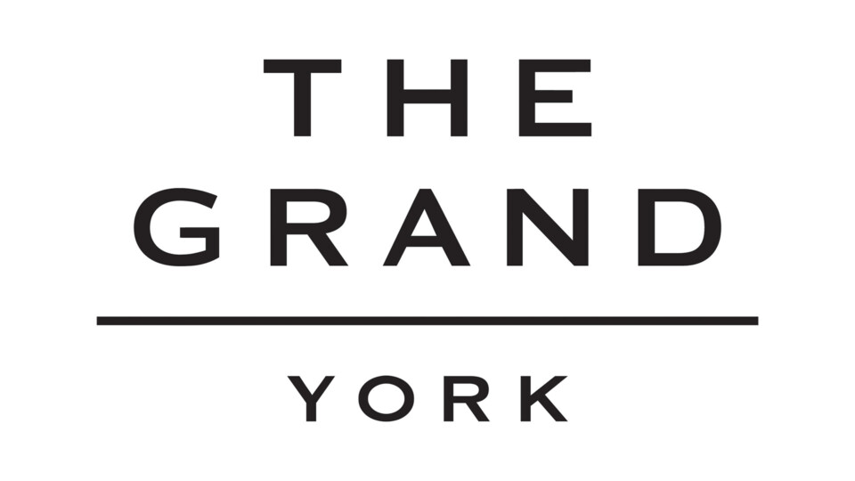 Patrons_0000_THEGRAND_Vertical_Logo_CMYK
