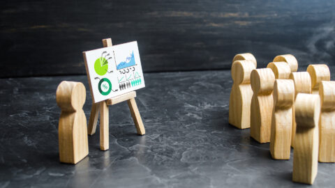 People listen to the report at the meeting. Presentation of work results, summing up, negotiating. Business analytics, marketing research. Economic reporting, forecasting. Project development.