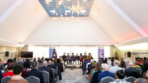 Institute-board-members-on-the-dais-from-the-back-of-the-room-1-e1771855522635-Firefly-Upscaler-2x-scale.jpg
